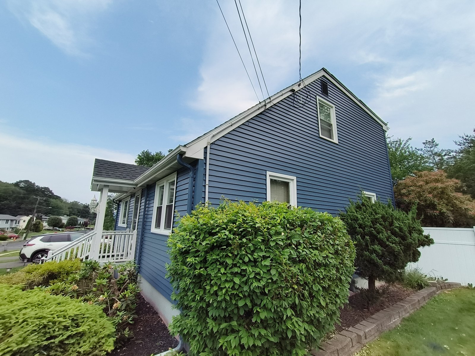 Exterior House Blue Siding White Trim 2 — Frank Leonard Painting LLC