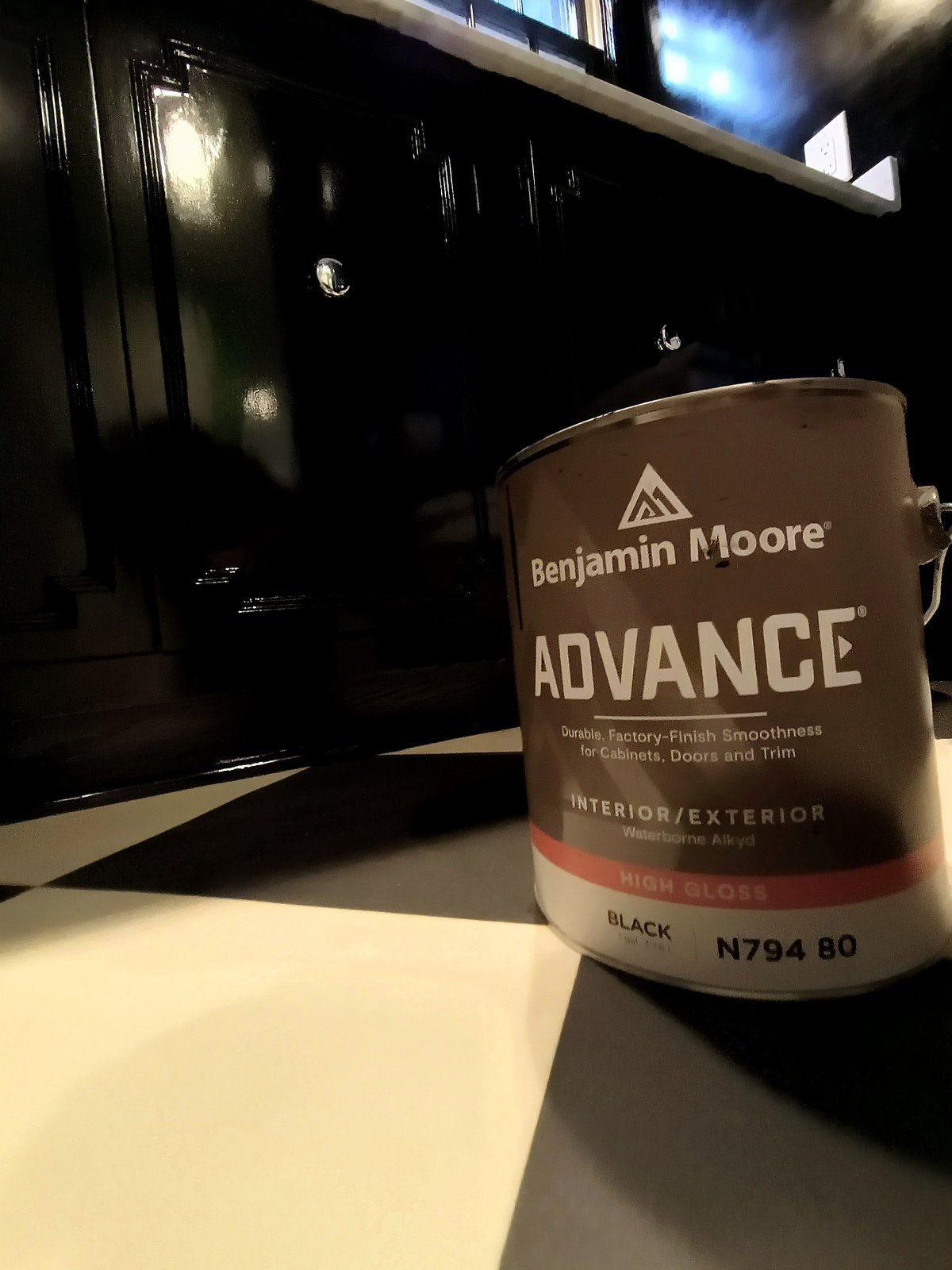 Kitchen cabinets — black high-gloss paint